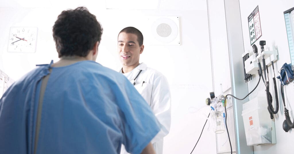 A doctor examines a patient